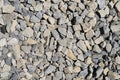 The texture of stone gravel gray. Stone rubble gray poured pile close-up. The path of stone rubble Royalty Free Stock Photo