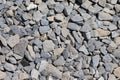 The texture of stone gravel gray. Stone rubble gray poured pile close-up. Stone path crushed Royalty Free Stock Photo
