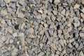 The texture of stone gravel gray. Stone rubble gray poured pile close-up. Stone path with Royalty Free Stock Photo