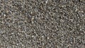 The texture of stone gravel gray. Stone rubble gray poured pile close-up Royalty Free Stock Photo