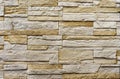 Texture of the stone wall. Panel of stones for finishing the facade of the building and interior design of the house. Background Royalty Free Stock Photo