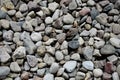 The texture of the stones for intros or background. smooth sea stones and large sharp gravel construction