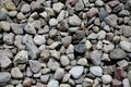 The texture of the stones for intros or background. smooth sea stones and large sharp gravel construction Royalty Free Stock Photo