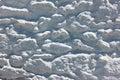 Texture of stonework covered by white stucco