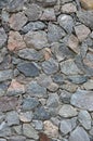 The texture of a strong stone wall of many concreted stones of various shape Royalty Free Stock Photo