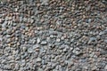 The texture of a strong stone wall of many concreted stones of various shape Royalty Free Stock Photo