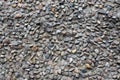 The texture of a strong stone wall of many concreted stones of various shape Royalty Free Stock Photo