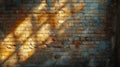 Texture of a sunlit brick wall with the play of light and shadows giving it depth and dimension