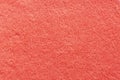 The texture of the terry towel is coral color. Abstract red soft fabric background Royalty Free Stock Photo