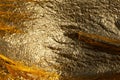 Texture of a thin crumpled sheet of foil. Crumpled foil background. Stock photo foil. Gold chrome color Royalty Free Stock Photo