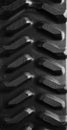 Texture of tractor wheel tyre in black and white Royalty Free Stock Photo