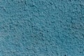 The texture of the uneven plaster is painted in blue