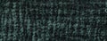Texture of velvet dark green background from a soft upholstery textile material, macro. Abstract velour emerald fabric Royalty Free Stock Photo