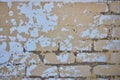 The texture of a very old brick wall with a peeling and rough co Royalty Free Stock Photo