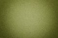 Texture of vintage light green paper background with matte vignette. Structure of olive kraft cardboard with frame Royalty Free Stock Photo