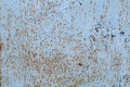 Texture of vintage rusty blue iron wall background with many layers of paint