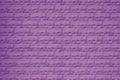 Texture of a violet brick wall. Brick background bright purple. Purple brick wall pattern. Interior detail. Design background. Emp Royalty Free Stock Photo