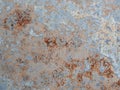Texture of wall with brass and aqua patina. Blue silver surface with streaks of rust. Rusty corrosion. Brown, grey, blue and