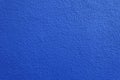 Texture of wall with coarse blue roughcast finish Royalty Free Stock Photo