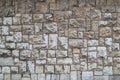 Texture of the wall made of stone blocks of different sizes and light gray color Royalty Free Stock Photo