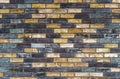 The texture of the wall from the new gray-yellow bricks. Royalty Free Stock Photo