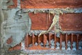 The texture of the wall of red brick with cement and mounting foam Royalty Free Stock Photo