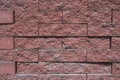 texture of a wall with red stone bricks with a grungy relief Royalty Free Stock Photo