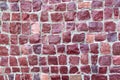 texture of the wall of red stones of different shapes and sizes