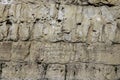 Texture of wall surface made of unevenly cut Jerusalem stones. Royalty Free Stock Photo