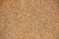 Texture washed sand background.Small sand stone of sand wall texture or sand wall background. Royalty Free Stock Photo