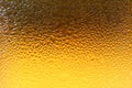 Texture of Water Droplets on Yellow Gold Color Lager Beer Glass Royalty Free Stock Photo