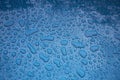 Texture - water drops on a blue body of the car Royalty Free Stock Photo