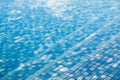 Texture of water surface, surface of blue swimming pool. Royalty Free Stock Photo