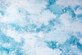 Texture of white-blue Christmas plaster, top view, copy space. Winter background Royalty Free Stock Photo