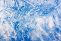 Texture of white cotton fabric with abstract blue spots. Natural fabric background Royalty Free Stock Photo