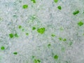 Texture of white and green crystalline granules