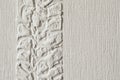 Texture of white painted wall with stucco