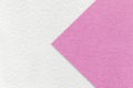 Texture of white paper background, half two colors with lilac and pink arrow, macro. Craft purple cardboard Royalty Free Stock Photo