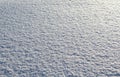 Texture white snow in sunny weather background Royalty Free Stock Photo