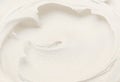 Texture of white vanilla ice cream close-up shot, white background for design. Royalty Free Stock Photo