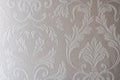 Texture of white wallpaper with a pattern