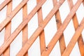 Texture of the wooden lattice isolated on white background. Natural wooden diagonal lattice Royalty Free Stock Photo