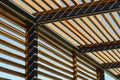 Texture of wooden lattice wall and roof, parallel boards. Abstract urban, geometric perspective Royalty Free Stock Photo