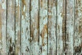 The texture of the wooden planks has faded in the sun. Wooden wall in gray-brown tones. Old wood background, board textures Royalty Free Stock Photo