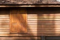 Texture of wooden wall and window of traditional thai style house