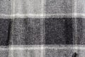 texture of wool fabric in black and white colors. Checkered plaid, noisy structure Royalty Free Stock Photo