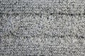 Texture wool, knitt, horizontal line, material witha pattern `pigtail`, gray ,  close-up. Royalty Free Stock Photo