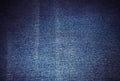 Texture of worn jeans. Rectangular horizontal denim background.