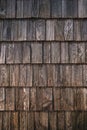 Texture of worn wooden roof tile pattern, detail of a typical old slovenian alpine cottage roofing Royalty Free Stock Photo