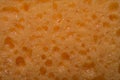 texture worn yellow sponge for washing dishes , close-up abstract background Royalty Free Stock Photo